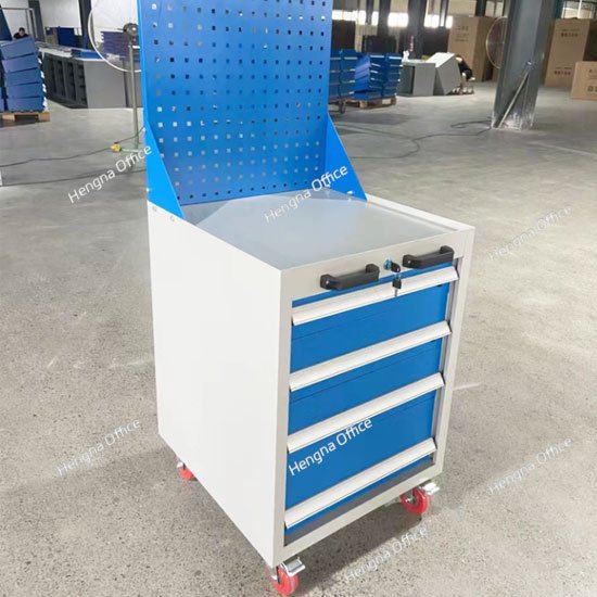 CNC machining workshop with organized tool trolley