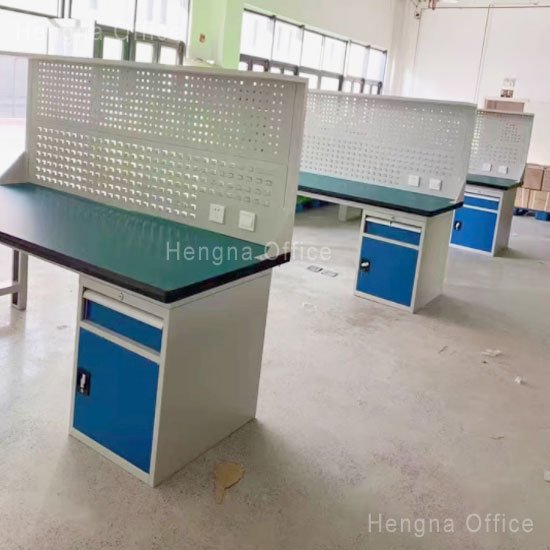 workbench in food processing facility, clean surface with drawer storage underneath