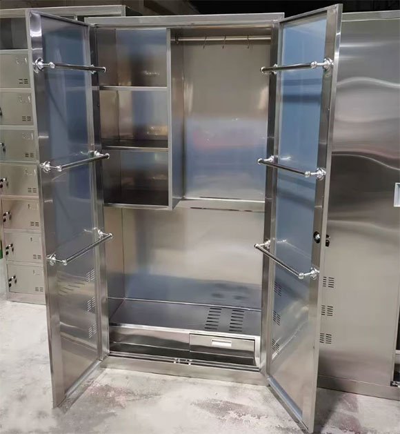 Stainless Steel vs Powder-Coated Janitor Cabinet — Which Lasts Longer in Hotel Housekeeping Rooms 2 Stainless steel double-door janitor cabinet, open interior view with hanging bars, fixed shelves, and lower ventilation slots — built for hotel housekeeping rooms.