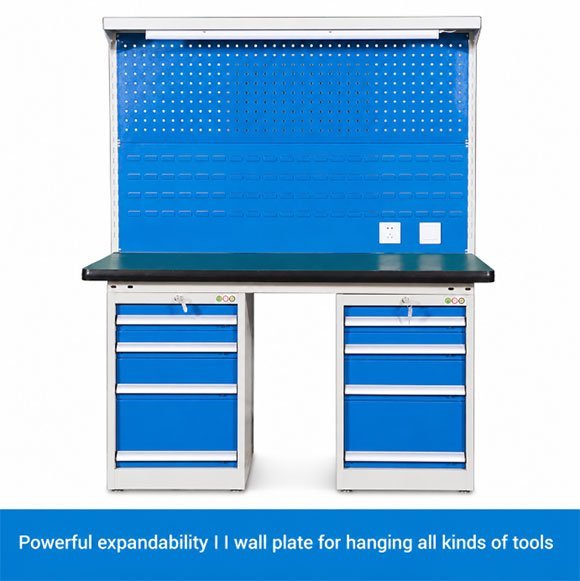 Assembly Workbench with Ball-Bearing Drawers — No Drawer Sag, No Top Flex, Trade Supply 1 Blue assembly workbench with a square-hole pegboard back panel, overhead light bar and two power sockets, a steel top and a four-drawer cabinet on each side, each drawer with its own lock
